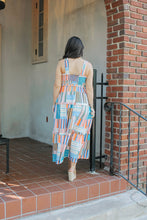 Load image into Gallery viewer, The Multi Color Smocked Dress is a vibrant and stylish addition to any wardrobe. Made with a smocked design, it provides a comfortable and flattering fit for all body types. Its multi color pattern adds a touch of playfulness and versatility to any outfit. Perfect for any occasion, this dress is a must-have for fashion-forward individuals.
Available in sizes, Small, Medium, Large and Xlarge.