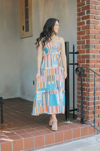 The Multi Color Smocked Dress is a vibrant and stylish addition to any wardrobe. Made with a smocked design, it provides a comfortable and flattering fit for all body types. Its multi color pattern adds a touch of playfulness and versatility to any outfit. Perfect for any occasion, this dress is a must-have for fashion-forward individuals.
Available in sizes, Small, Medium, Large and Xlarge.
